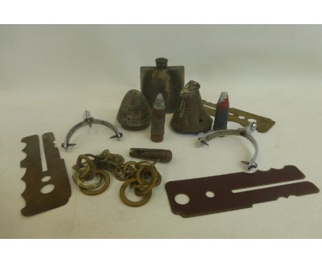 Two artillery shell fuzes, with two inert cannon shells, an R.A.F. shoulder flask and other military items.
