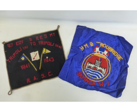 A Tripoli 1941-1943 Royal Army Service Corps embroidery and an H.M.S. Troubridge embroidery.