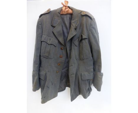 A German Army jacket, possibly WWII Third Reich a/f.