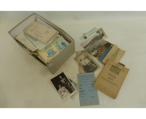 A box of assorted ephemera, including letters, postcards and ration books; also a War Office 1951 Drill (All Arms) Manual.