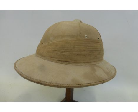 A pith helmet with liner and chin strap made by Comfortease.