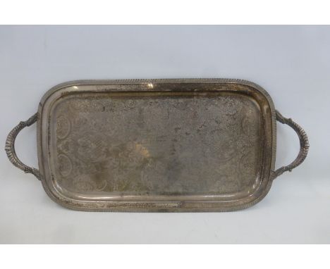 A large silver plated serving tray, approximately 23 1/4 x 10 1/2" including handles, engraved: Maj. P.B. Leonard. R Sig from