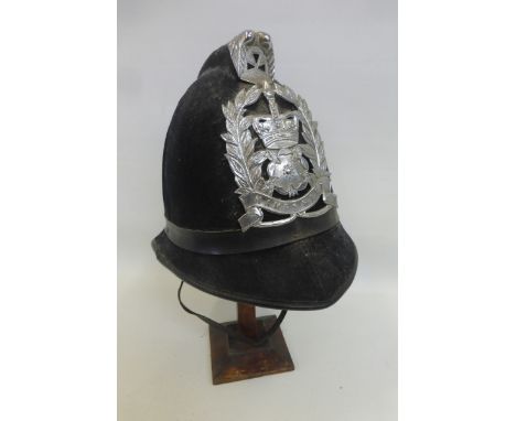 A Hampshire Police helmet with badge.