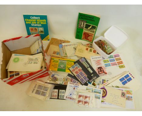 A box of mint stamps including sheets and first day covers, etc.