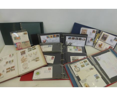 Eight albums of first day covers of various ages.