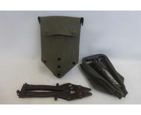 A pair of 1944 dated with WD arrow wire cutters and a 1985 entrenching tool in its case.