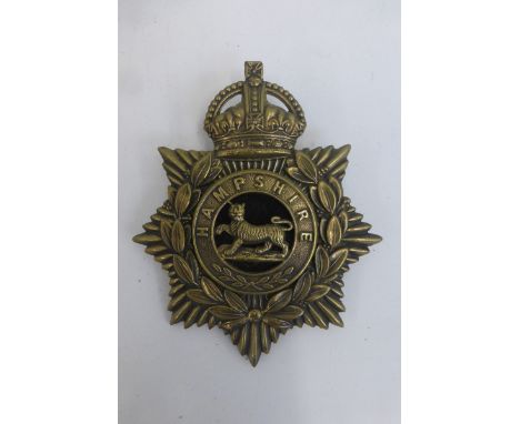 An early 20th Century Hampshire Regiment helmet plate with centre, retains its lugs to the reverse, approximately 5" x 4 1/4"