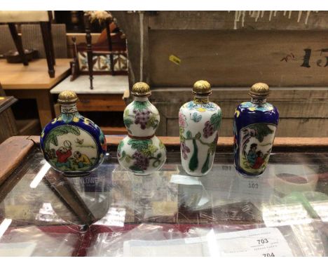 Four Chinese enamel snuff bottles
