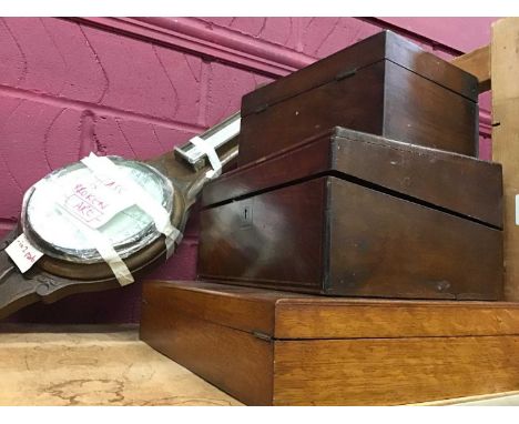 A writing slope and two other boxes together with a barometer
