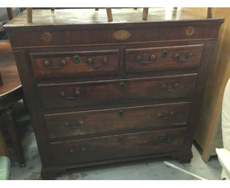 George III inlaid oak and mahogany chest with two short and three long graduated drawers on ogre bracket feet 124 cm wide, 12