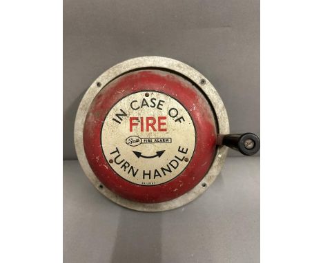 A vintage "in case of fire turn handle" fire alarm