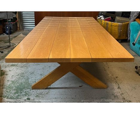 A large six plank light oak refectory table with X frame legs (H76cm W305cm D121cm)