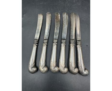 A set of six silver handled knives, hallmarked for Sheffield 1906 by Harrison Brothers & Howson