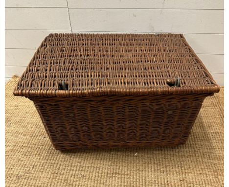 A vintage wicker laundry backet 