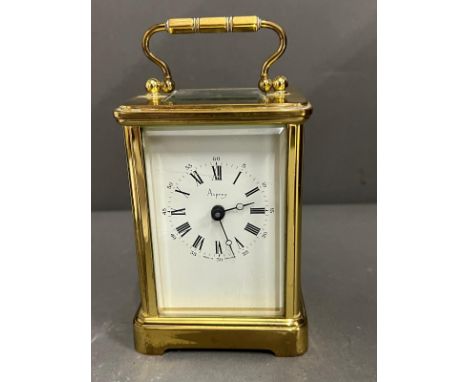 Asprey brass eight day carriage clock with key  Condition Report  in working order side glass loose 