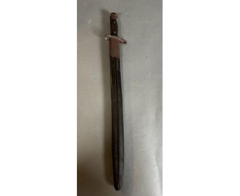 A 1907 pattern Sanderson bayonet in leather scabbard