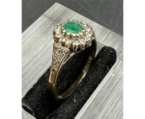 A 9ct gold ring with central emerald. Approximate Total weight 2.1g size N