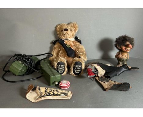 A selection of play worn vintage toys to include a yoyo, teddy bear and a troll 