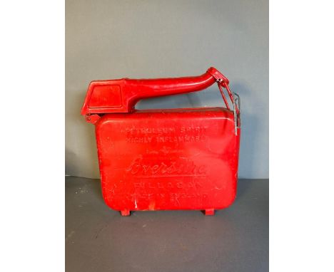 A red 1950's Eversure vintage petrol can