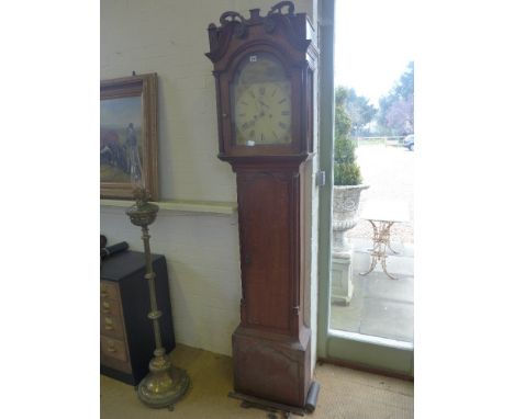 An 8 day longcase clock with a painted arched dial with seconds hand in an oak case with a pendulum and one weight - Height 2