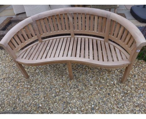 A Bramblecrest teak Banana bench - damaged back