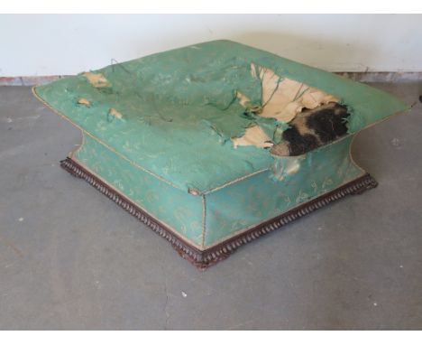 A good William IV early Victorian diamond shape enclosed stool or Ottoman with concave sides, carved mahogany feet and shallo