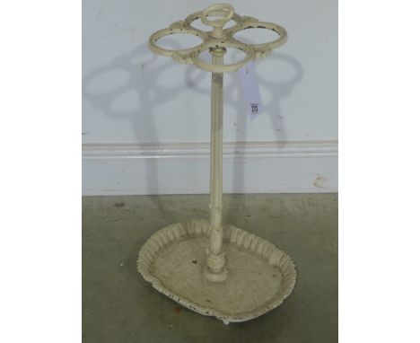A white painted cast iron stick stand 