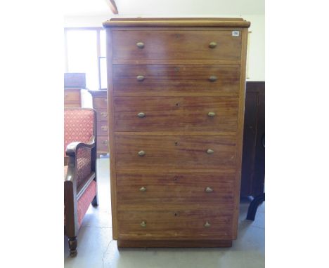 A ships chest of six long drawers raised on plinth base -Height 124 cm x Width  72cm  x Depth 56cm 