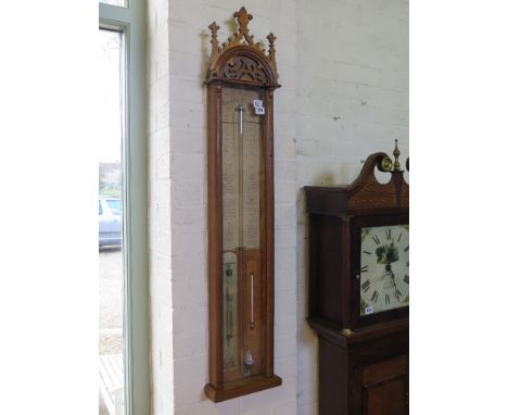 A good oak cased Admiral Fitzroy barometer with Gothic tracery decoration - Length 107 cm x Width 230 cm 