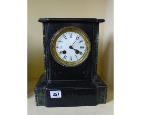 A black slate mantel clock, eight day striking on bell
Condition report: Working 