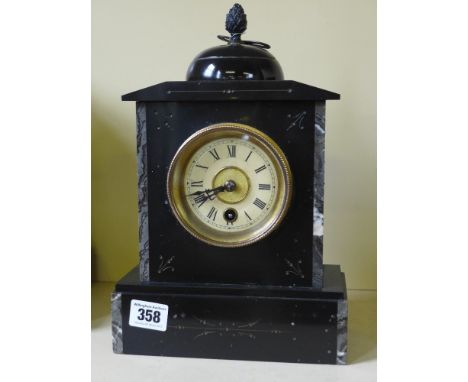 A black slate mantel clock with inlay dome top with acorn 
Condition report:  Working