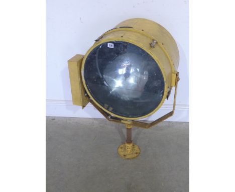 A very large Harley Aircraft Landing Light type FM - serial no. 9991 - yellow painted aluminium raising on iron gimble and st