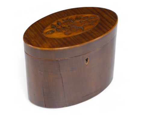 A George III oval inlaid sycamore tea caddy, 12cm high x 15cm wide. Condition - two splits to front.