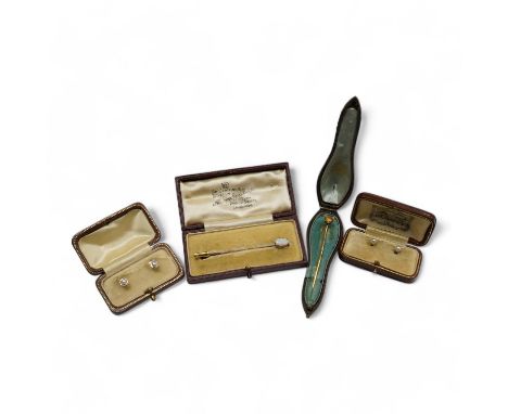 A group of gentleman's accessories, early 20th century, comprising: two pairs of cultured pearl collar studs, one set marked 