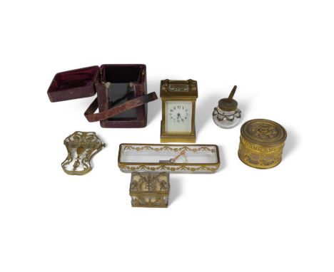 A brass cased carriage clock and five ormolu mounted glass desk accessories, clock 12cm high. Condition - unknown if clock wo