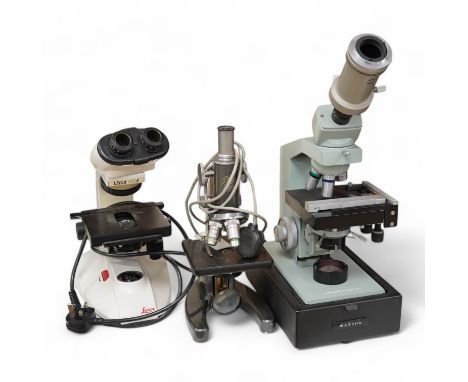 Three mid twentieth century microscopes; a Leica BM E binocular microscope, a Watson Microsystem 70 and a C. Baker, London, N