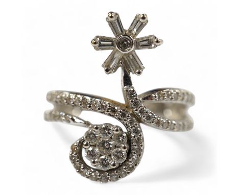 A modern 18ct white gold and diamond cluster set split shank double flower head ring, size K, gross weight 4.5 grams. Conditi