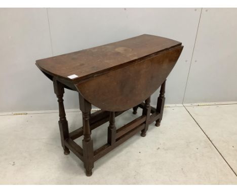 A small 18th century oak gate leg table, width 99cm, depth 38cm, height 72cm. Condition - fair