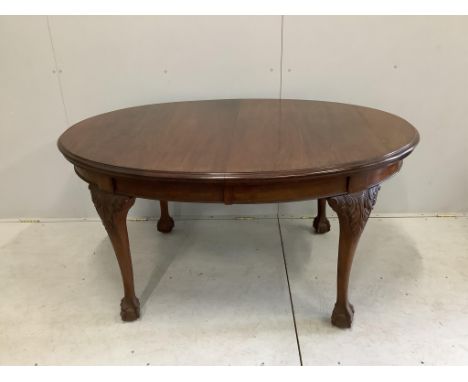A Chippendale Revival mahogany dining suite comprising extending dining table, 210cm extended, two spare leaves, depth 106cm,