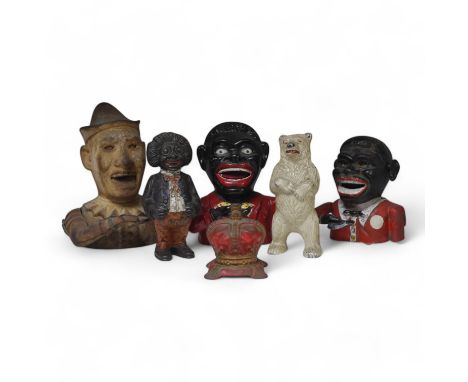Six various metalware money boxes to include to jolly money banks, standing bear and one in the form of a crown. Condition - 