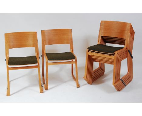 Chorus Furniture - a set of eight Camira Blazer II light oak and plywood stacking chairs, each having green cloth fabric fixe