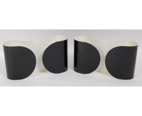A pair of contemporary Italian Flos Foglio twin wall lights, each outer black enamel painted, of shaped form, in sheet metal,