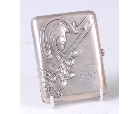 An early 20th century Russian silver pocket cigarette case, the cover with raised and engraved stylised image of a female pro