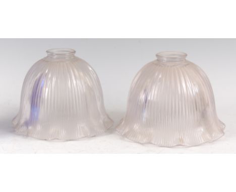A pair of Art Deco Holophane light shades, of angular ribbed and domed form with wavy rims, each with raised marks Holophane 
