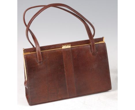 A vintage Mappin &amp; Webb lizard skin handbag, the interior with zipped compartment and twin pouches, with gilt metal hardw