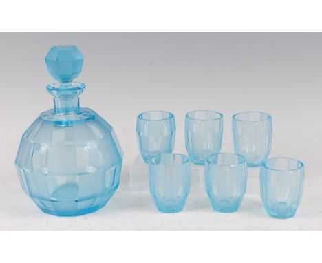 An Art Deco blue glass decanter set, of faceted form, with opposing frosted panels, comprising decanter and stopper, h.21cm, 