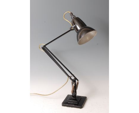 Herbert Terry - a black painted anglepoise lamp, model No.1227, of hinged and rotating form, with moveable shade, raised on s
