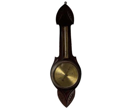 A 20th century carved oak barometer, height 83cm (af).