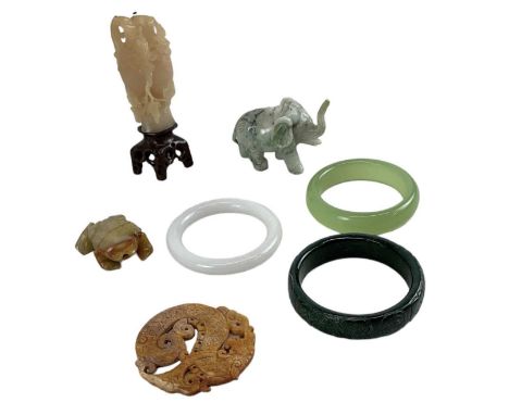 A group of Chinese carved hardstone items including a carved hardstone model of a toad, length 5cm, a carved hardstone tablet