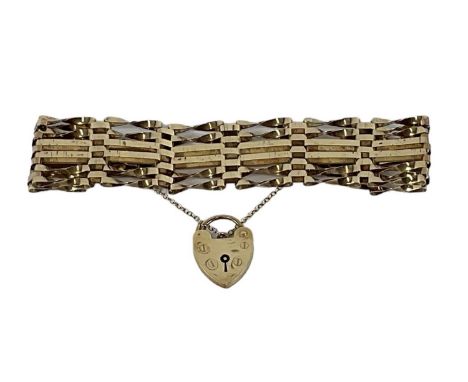 A 9ct yellow gold gate link bracelet, with padlock clasp, approx 14g.